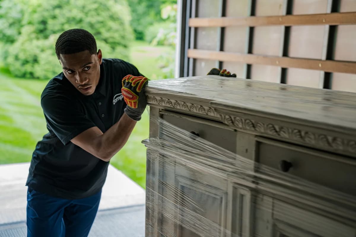 Professional movers loading truck