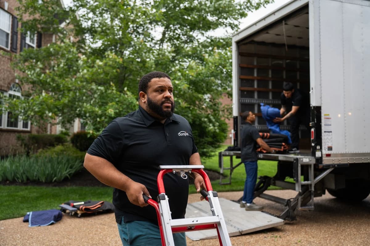 Professional movers loading truck